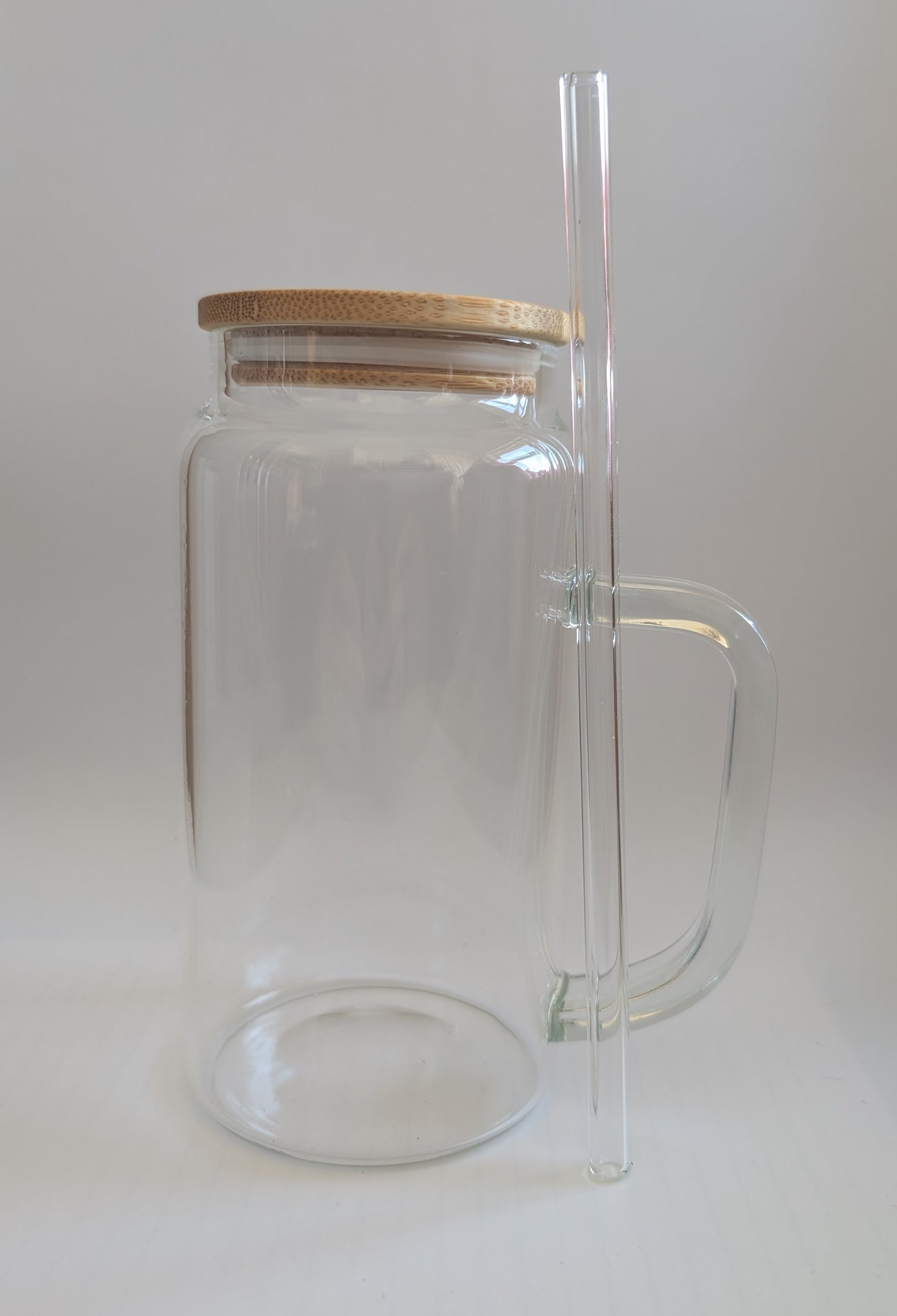 Glass mug with lid and straw