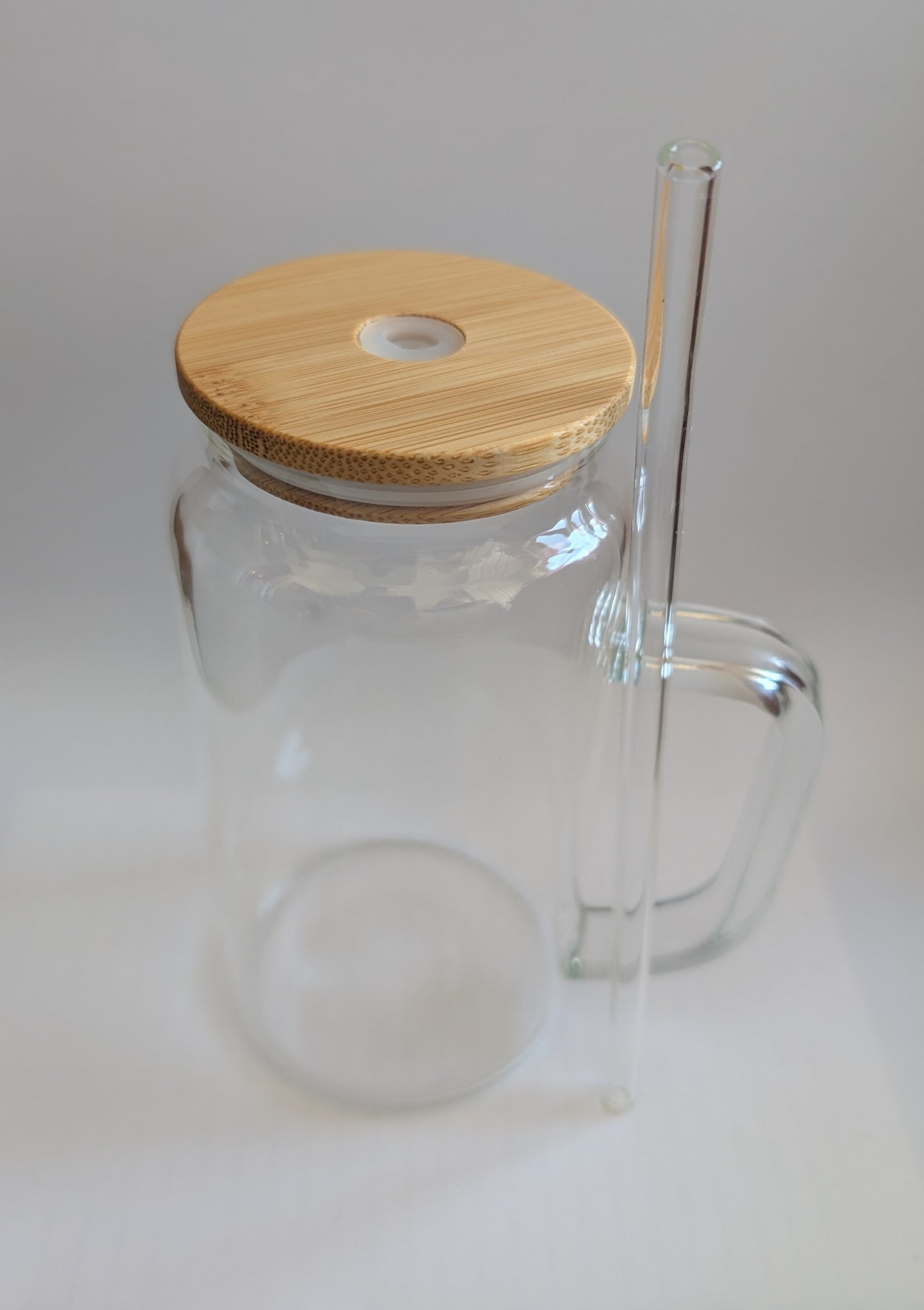 Glass mug with lid and straw