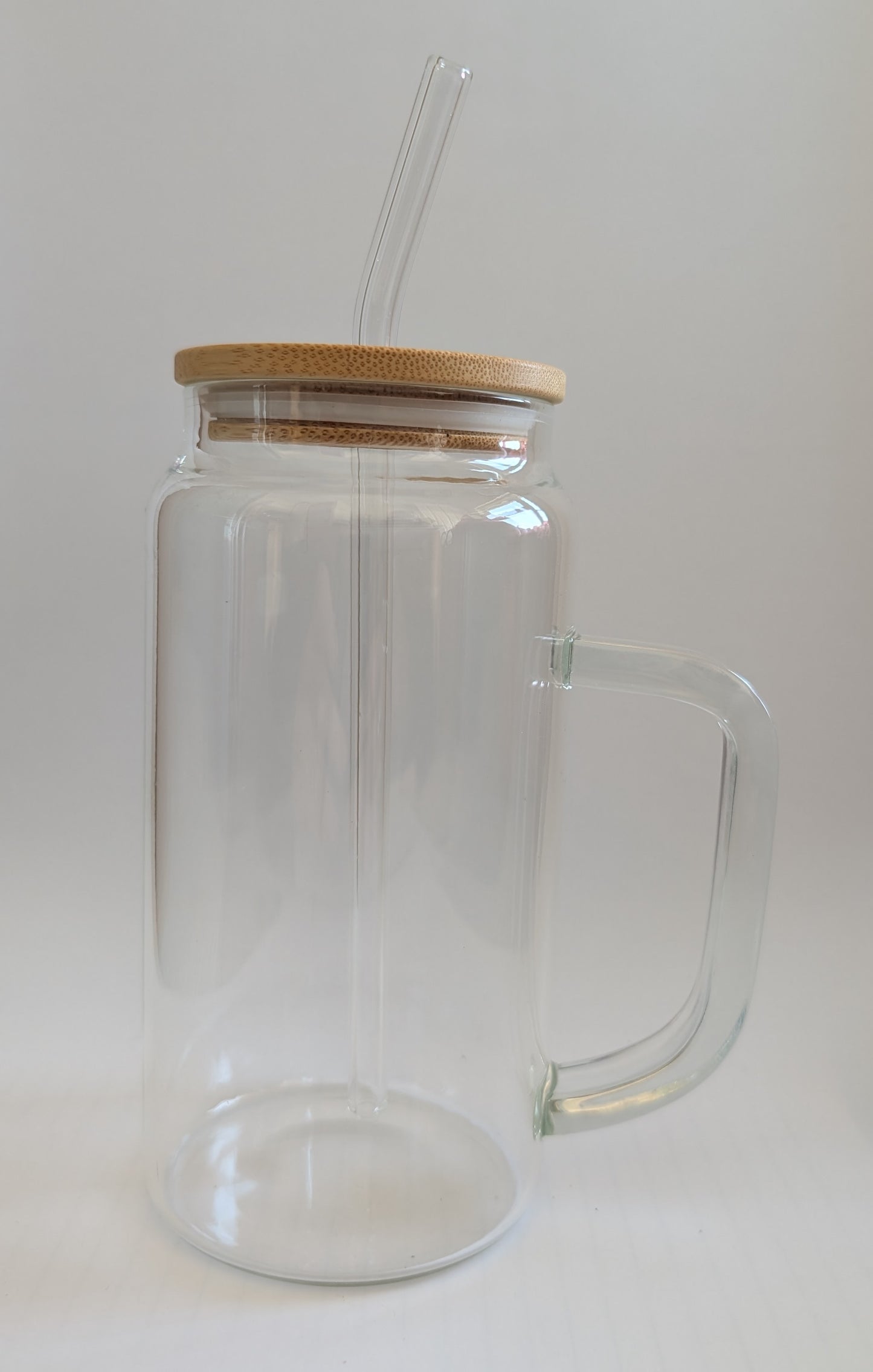 Glass mug with lid and straw